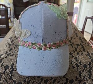 Embellished Blue Cap with Floral Accents
